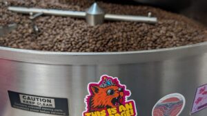 Freshly roasted coffee beans cooling in the Diedrich roaster at Armadillo Coffee Roasters