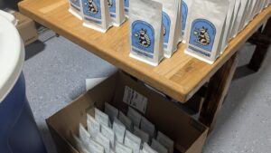 Freshly packed Armadillo Coffee Roasters bags ready for subscription delivery